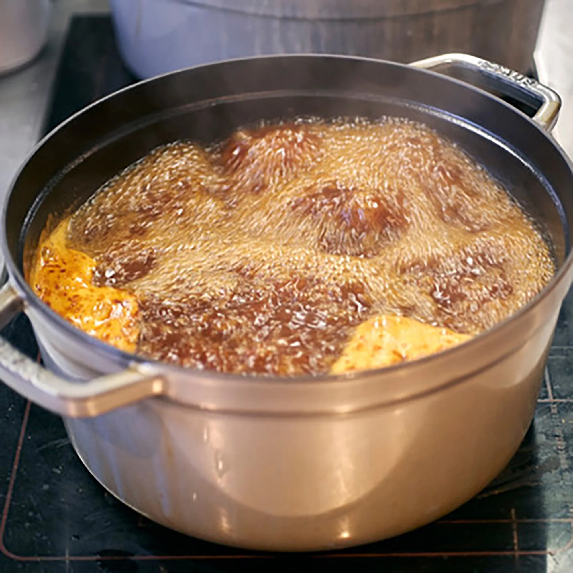 Staub Cast Iron 13.25-qt Round Cocotte - Grenadine